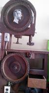 This is a handmade bandsaw using a craftsman motor. 